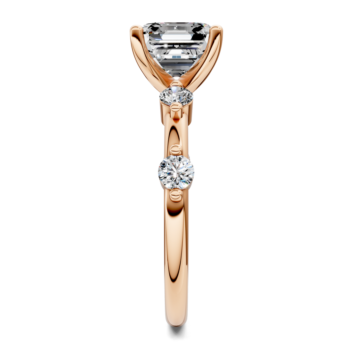Rose gold ring with triangular bezel center stone and two round sparkle accents
