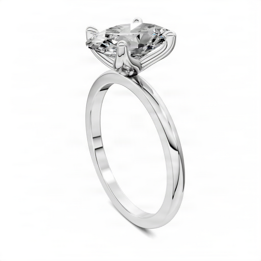 Silver oval gemstone ring angled view with four prongs and slim round-shank