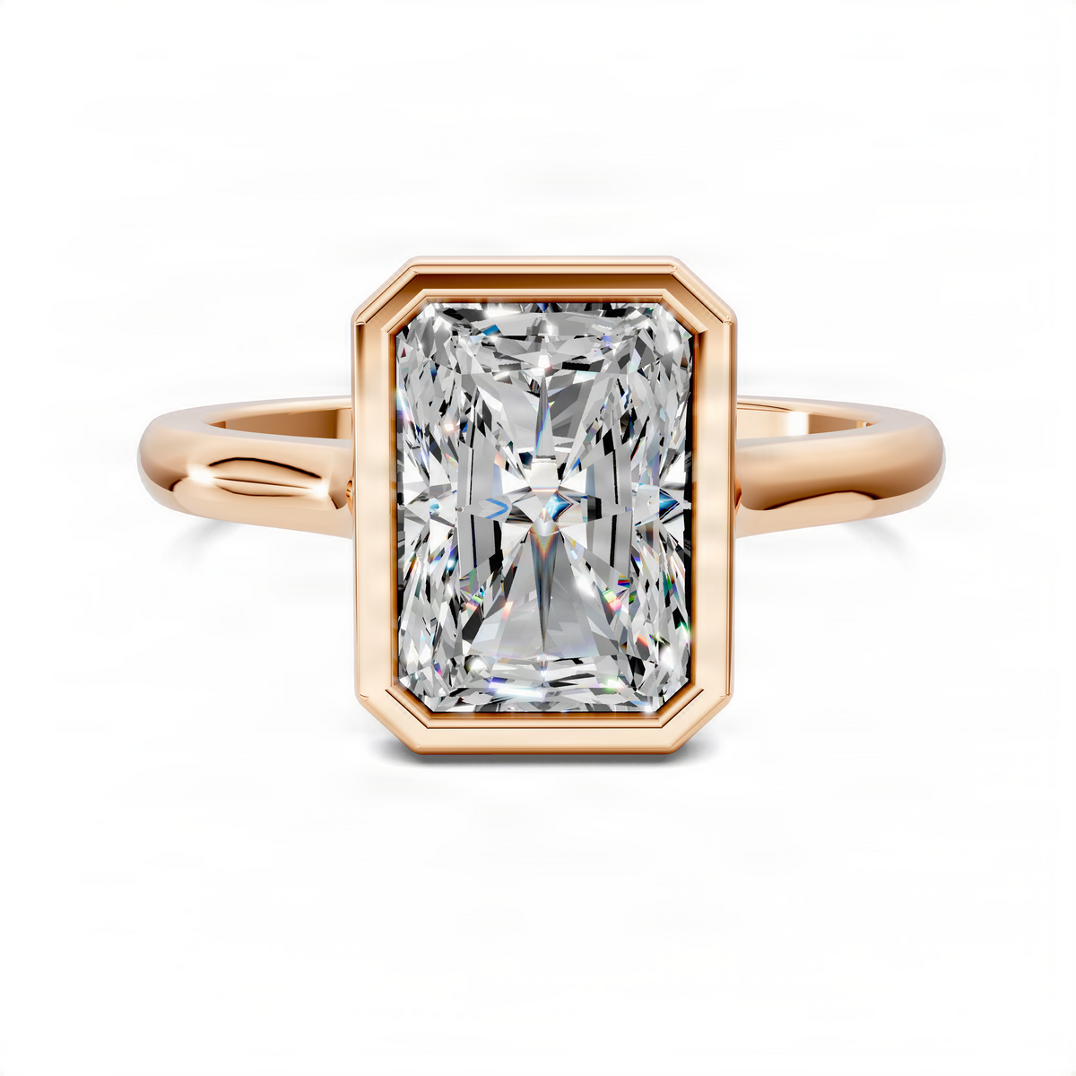Rose gold solitaire ring with radiant-cut bezel-set center stone and curved shank
