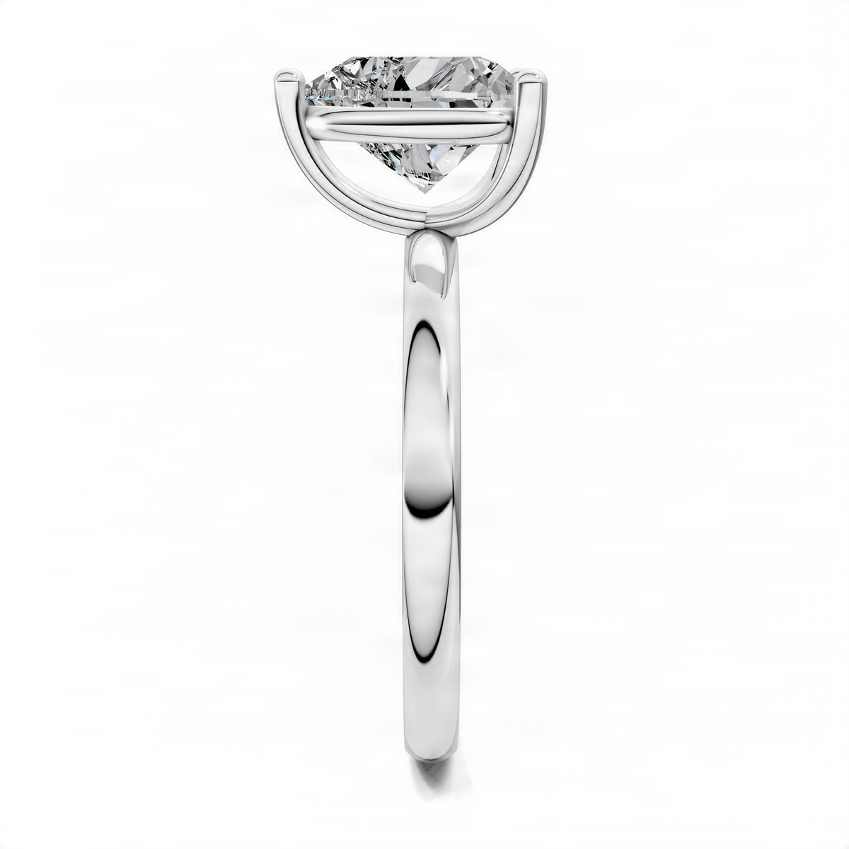 Silver-toned solitaire engagement ring with heart-shaped center diamond and tapered smooth shank