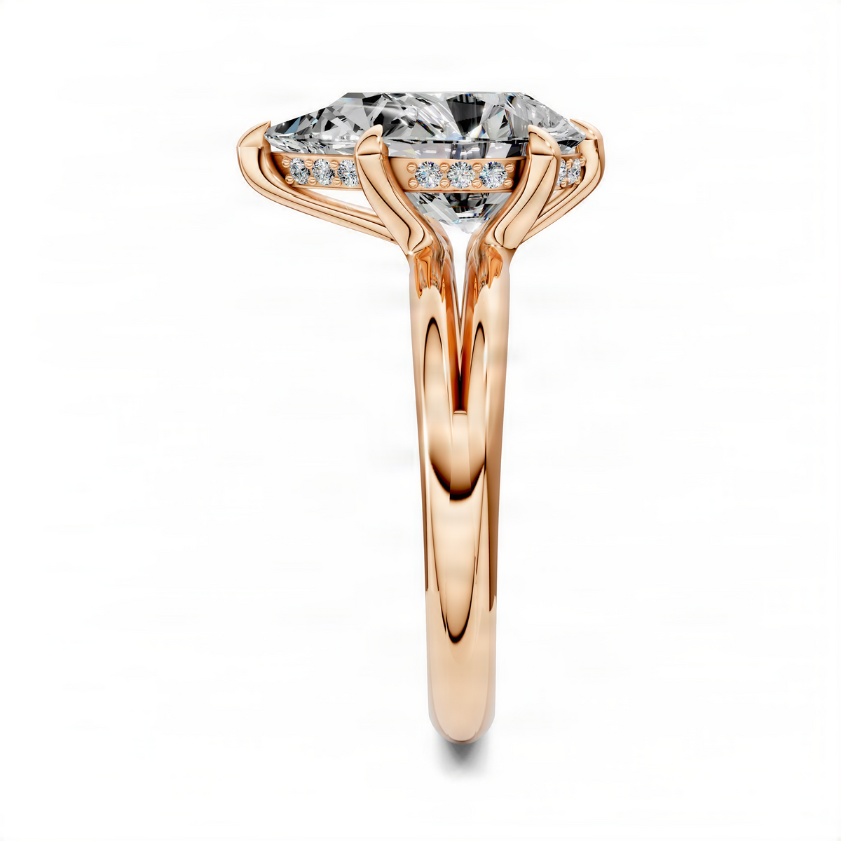 Rose gold pear diamond engagement ring with split band and side diamond accents