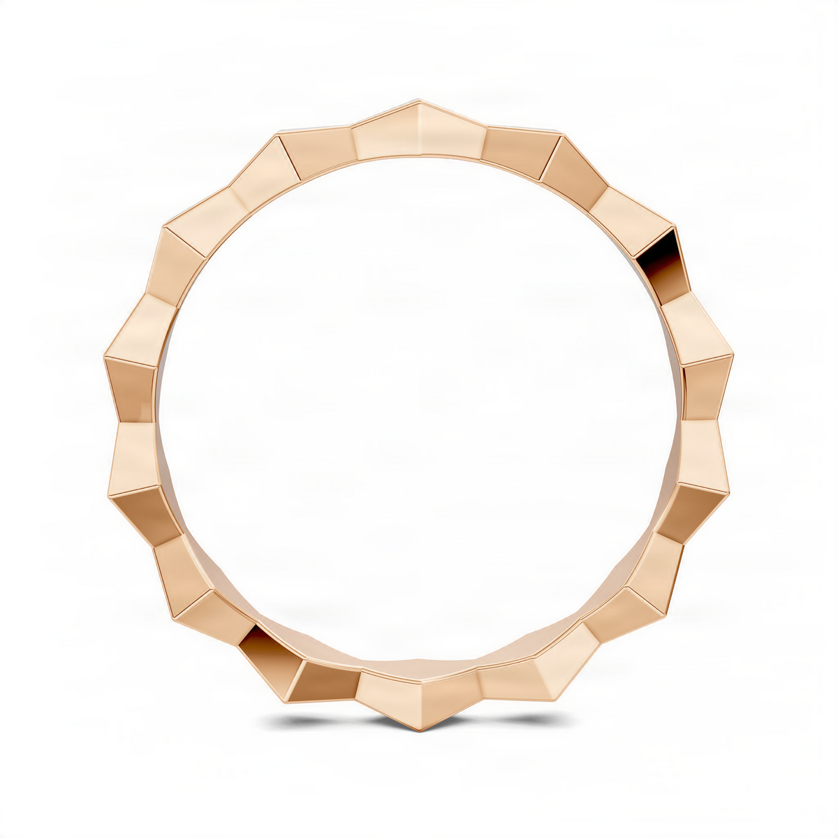 Geometric sculpture ring in rose-gold tone with a faceted, sculpted band profile.