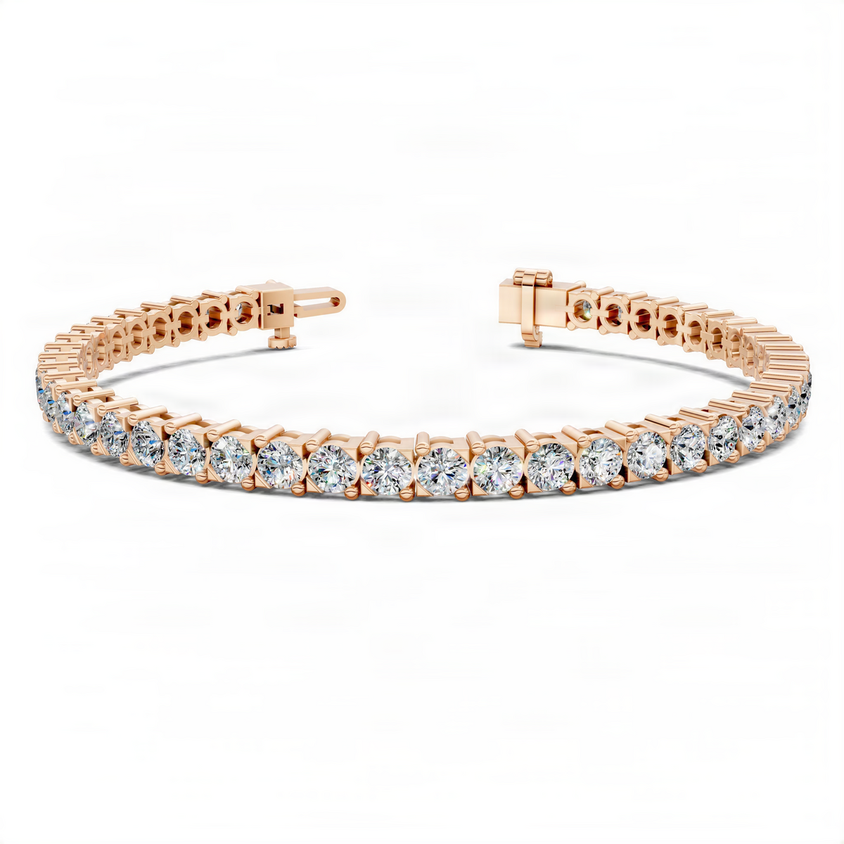 Rose gold-tone tennis bracelet with round prong-set stones and side view clasp