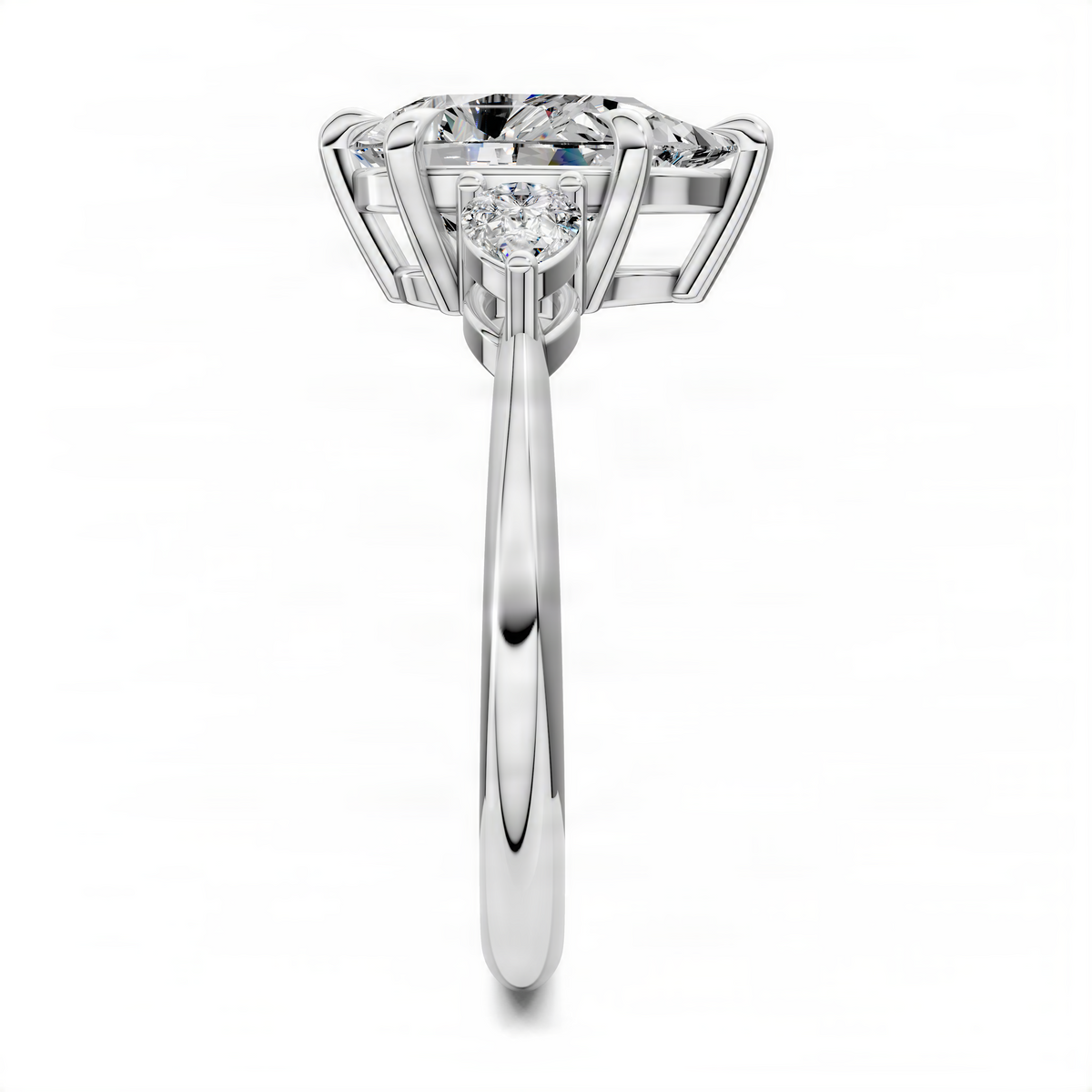 White gold three-stone engagement ring with pear-cut center diamond and side stones