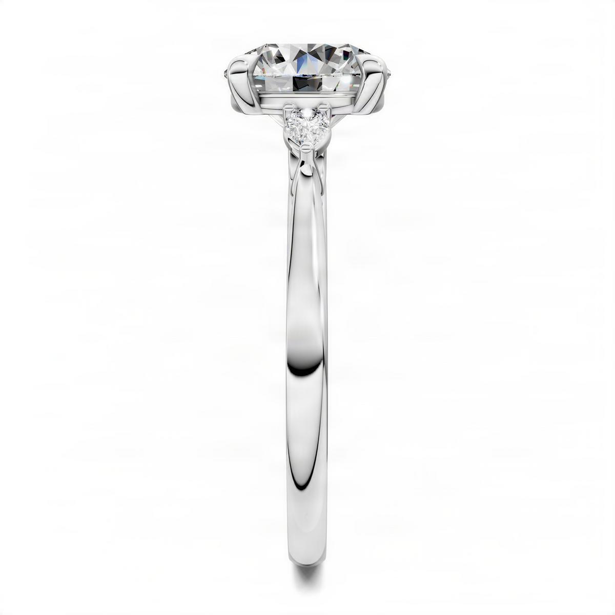 Round three-stone classic ring in white gold with large center round diamond and side stones