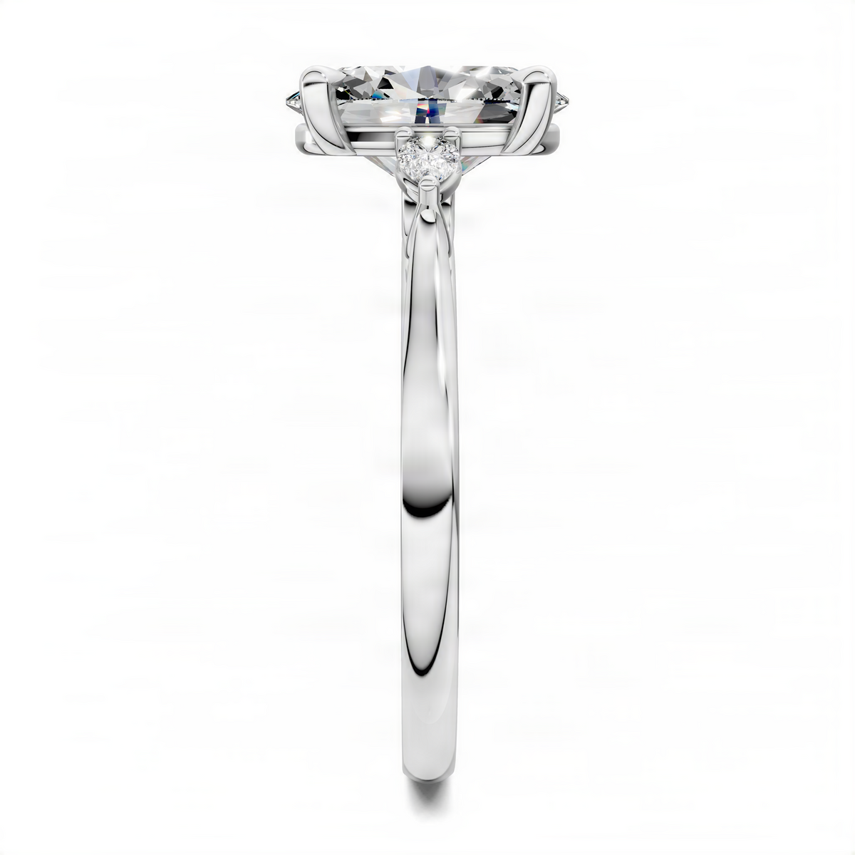 Oval three-stone classic ring in white metal with oval center stone and side stones