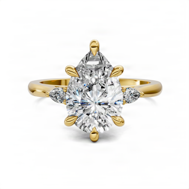 Opes Pear Three Stone Classic Ring
