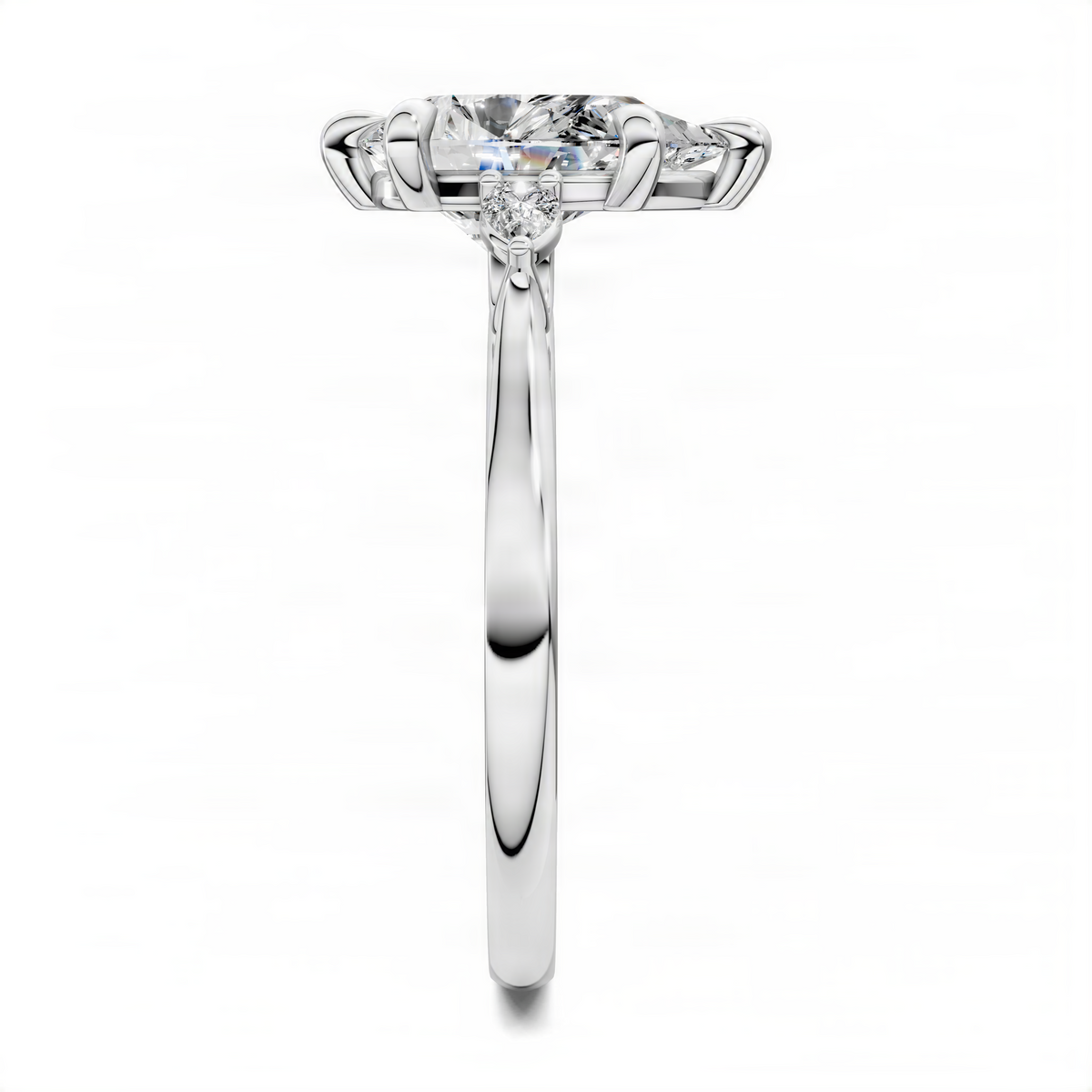 Three-stone diamond ring in white gold, round center with two side stones