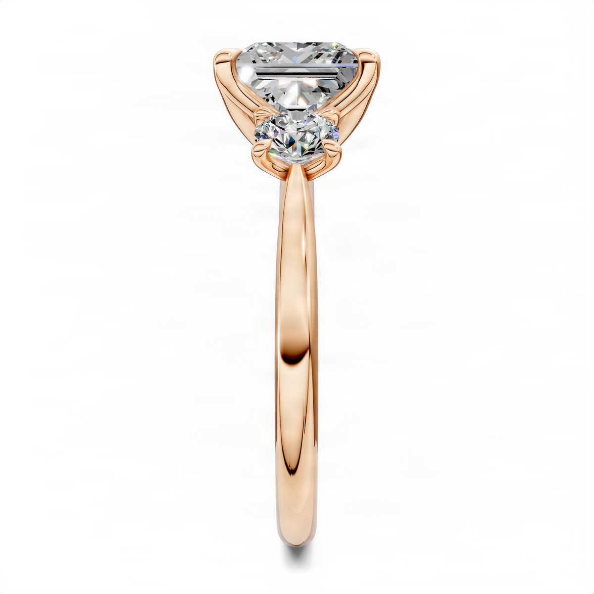 Rose gold three-stone ring with princess-cut center stone and two round side stones