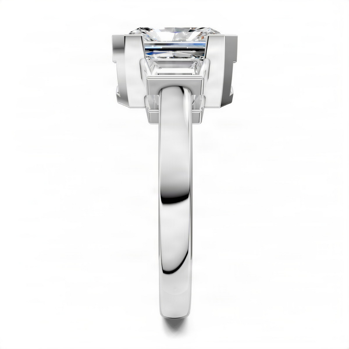 Three-stone bezel ring with radiant center stone, silver-toned setting
