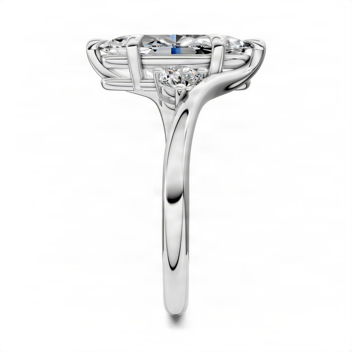 Platinum marquise three-stone bypass ring with round side stones and polished shank