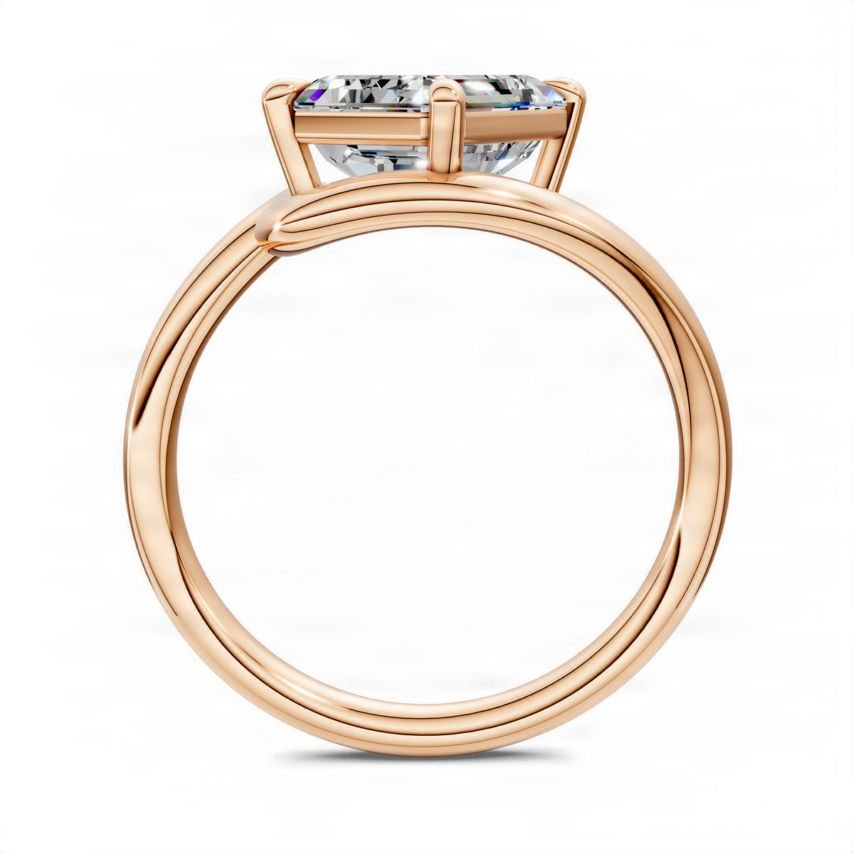 Rose gold sculptural solitaire ring with rectangular prong-set center stone