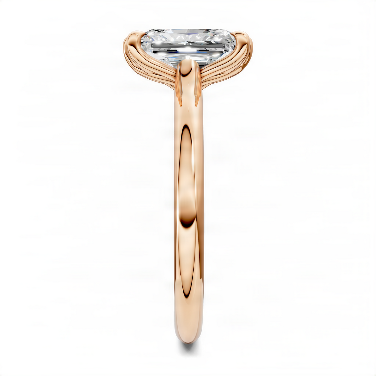 Single gemstone ring with rounded prong setting on rose gold band, top view