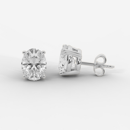 Oval cut lab grown diamond basket stud earrings in gold by Opes & Co