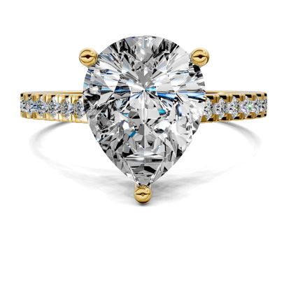 2.5 carat lab grown diamond engagement ring pear cut pavé setting in gold by Opes & Co