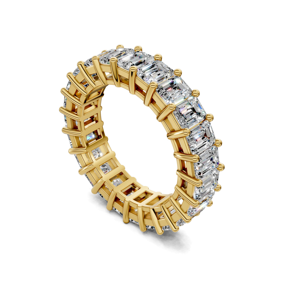 Yellow gold emerald-cut lab diamond eternity band ring, angled view of set stones