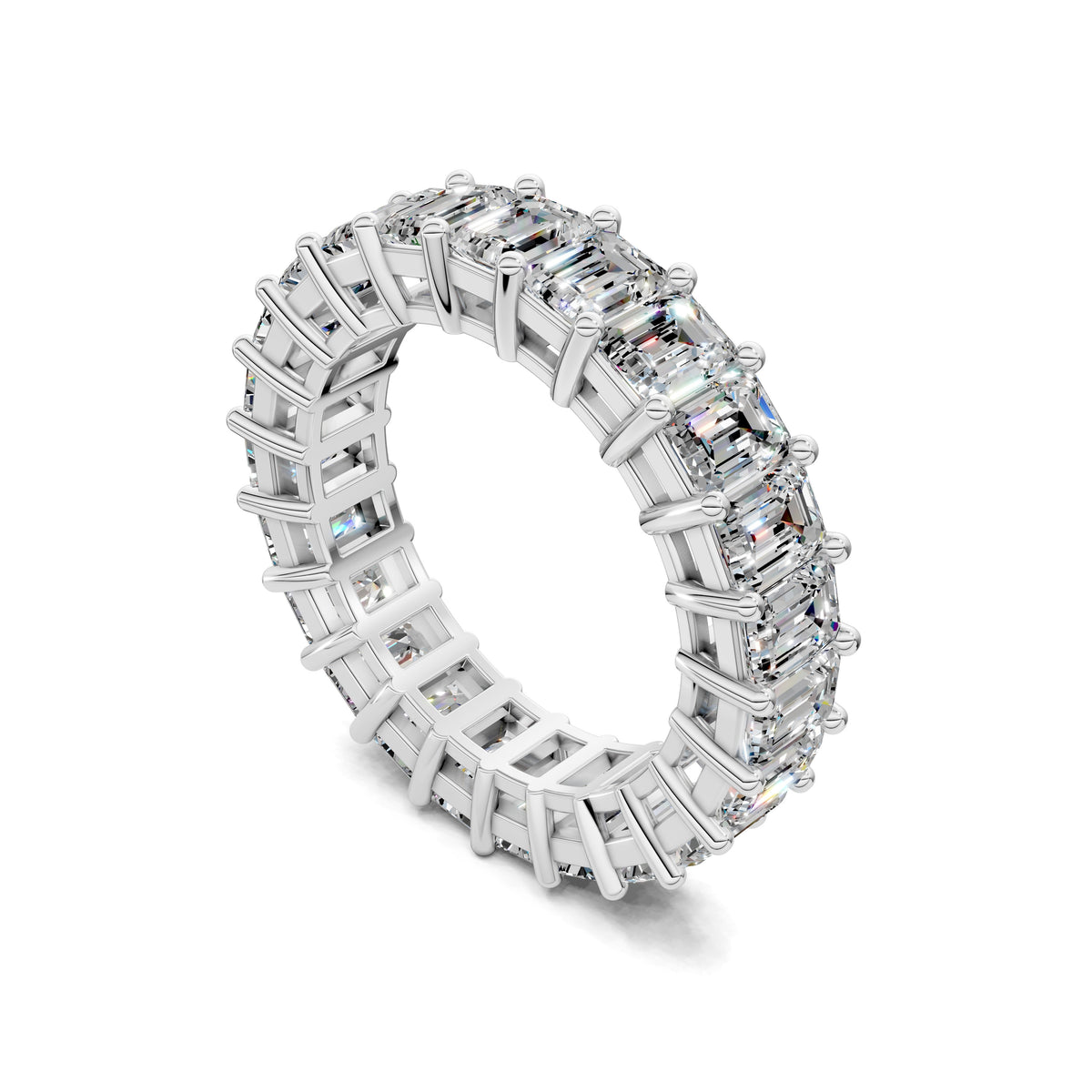 White gold emerald-cut lab diamond eternity band ring, angled view of set stones