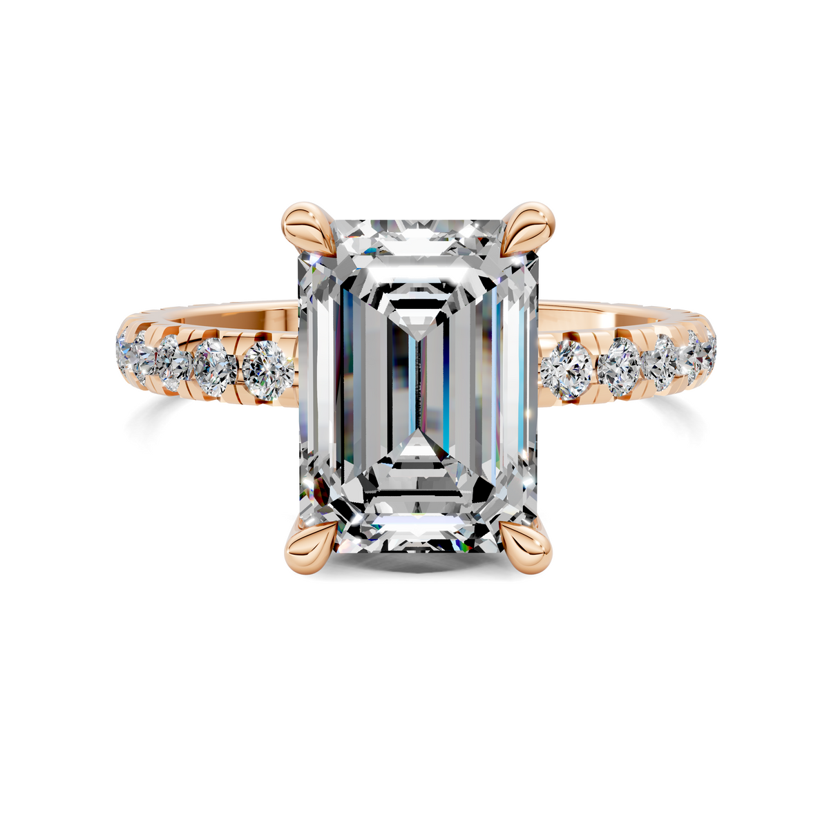 Claw-set emerald-cut accent ring in rose gold with baguette side diamonds