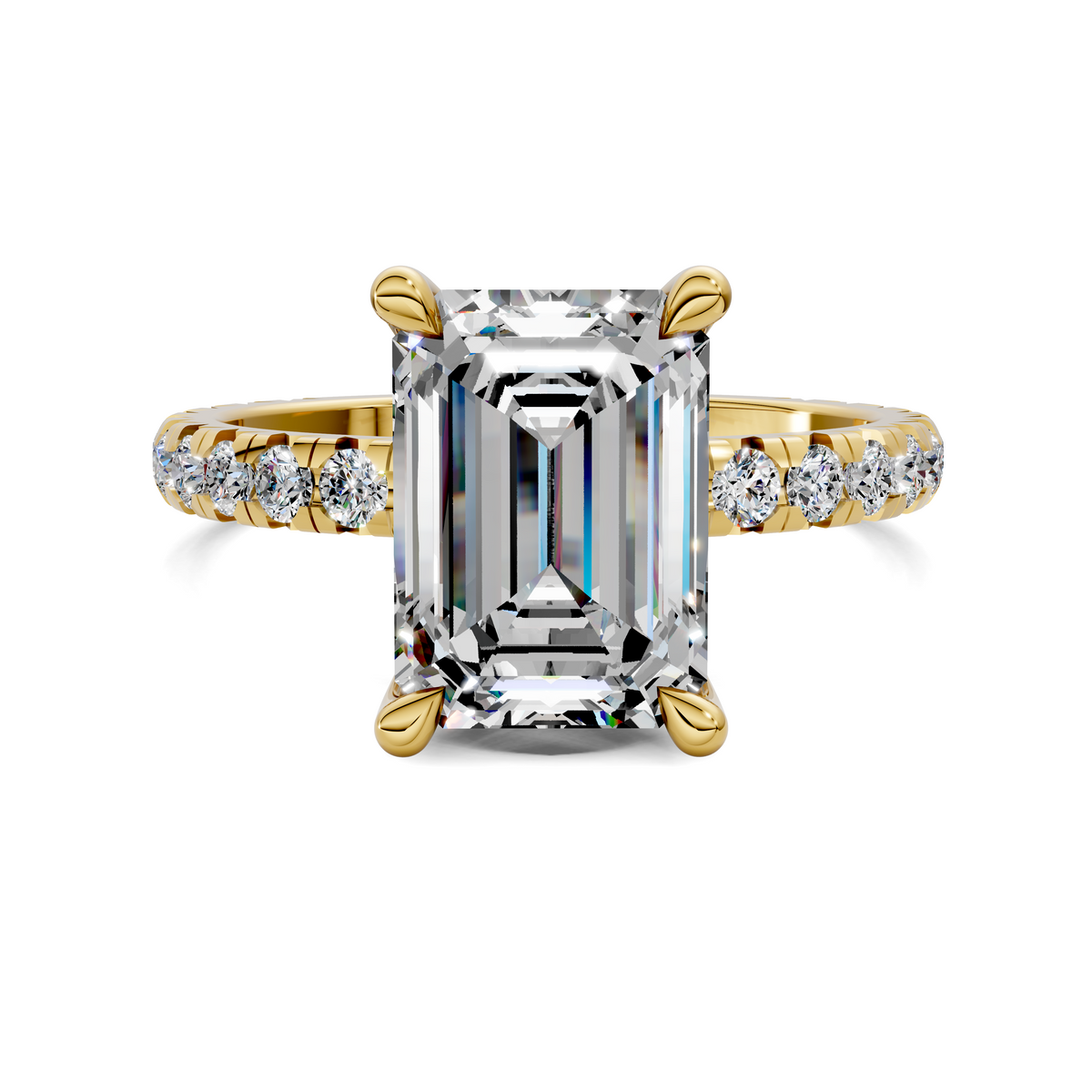 Claw-set emerald-cut accent ring in yellow gold with baguette side diamonds