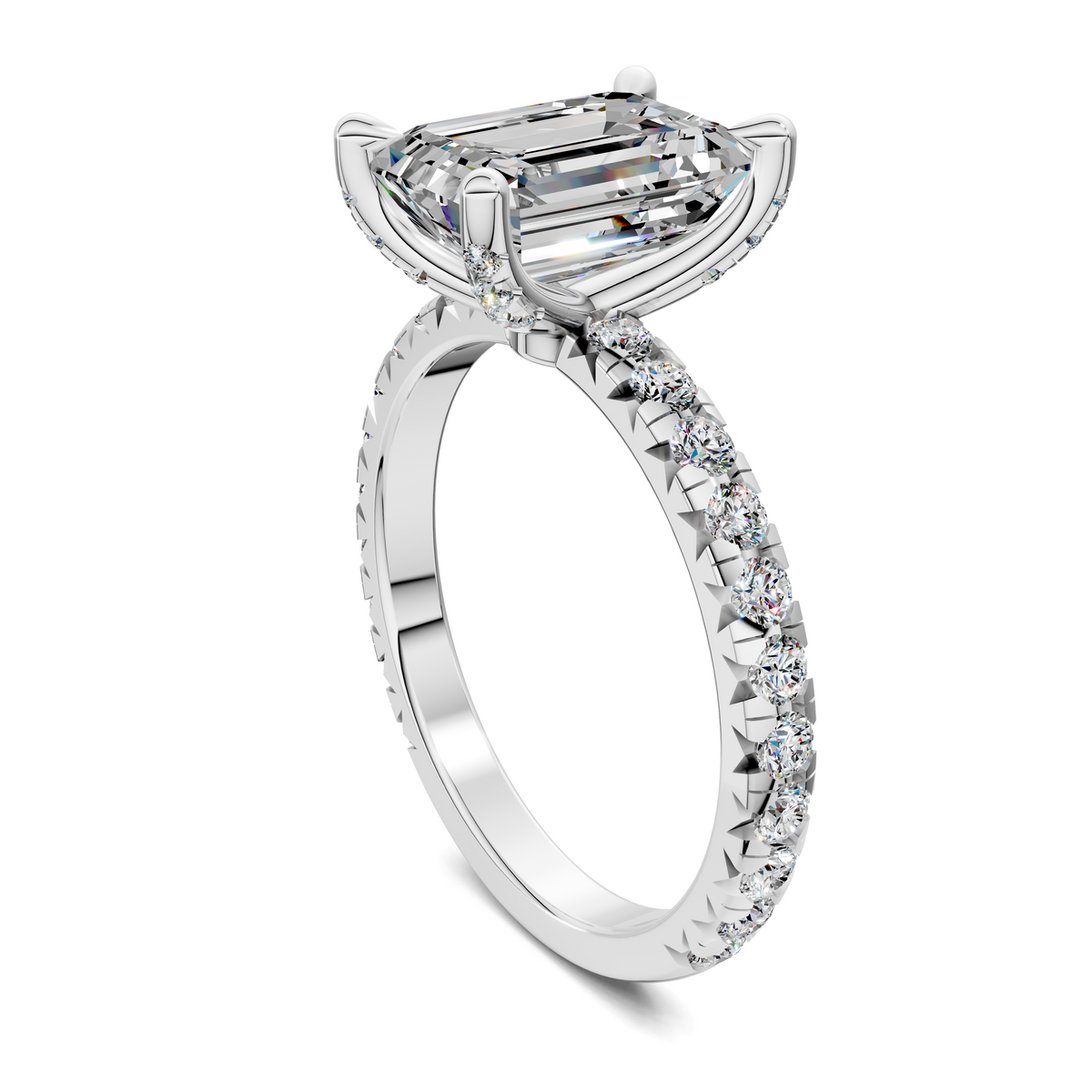 White gold claw-set emerald-cut ring with diamond halo and curved band