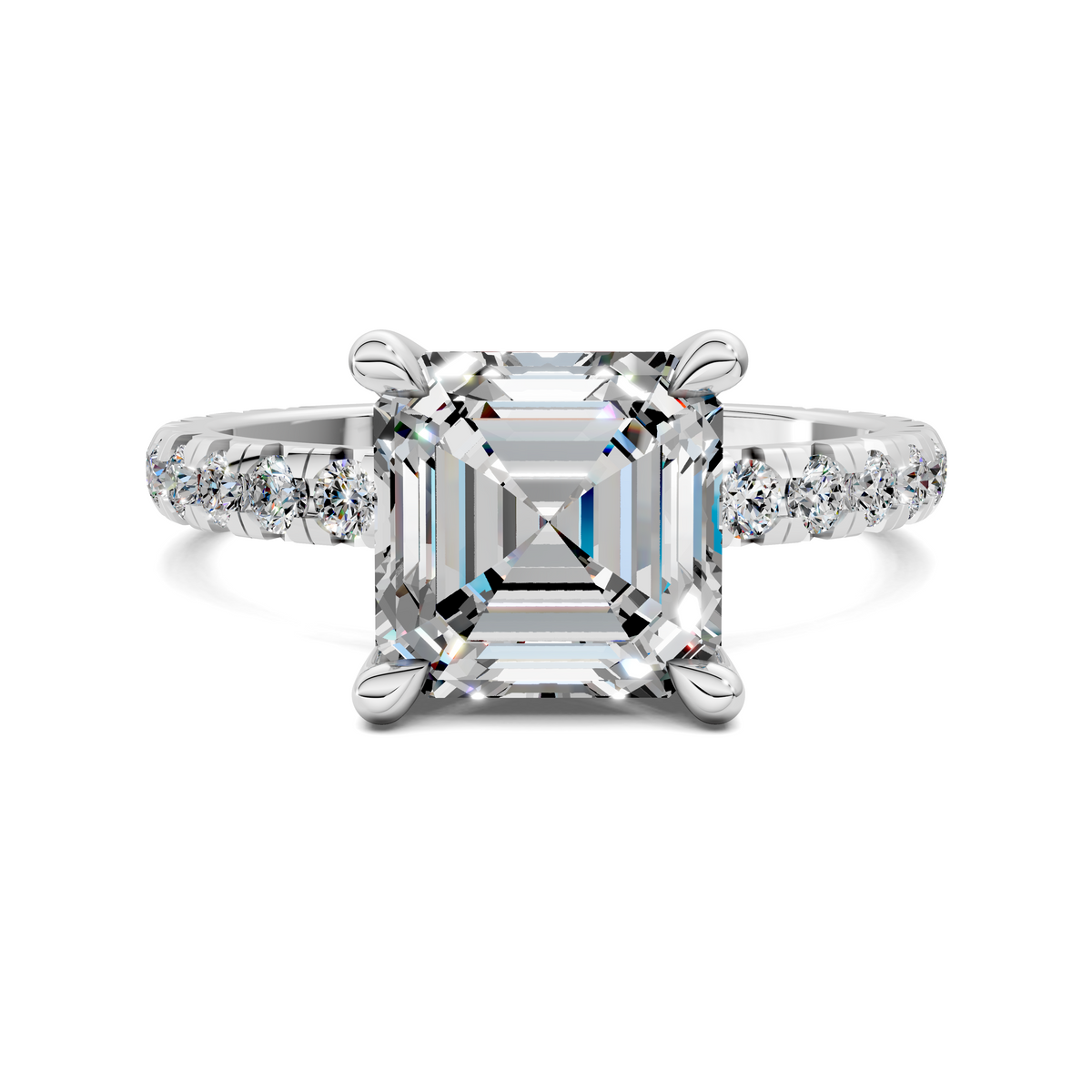 White gold claw-set emerald-cut center stone ring with diamond side stones