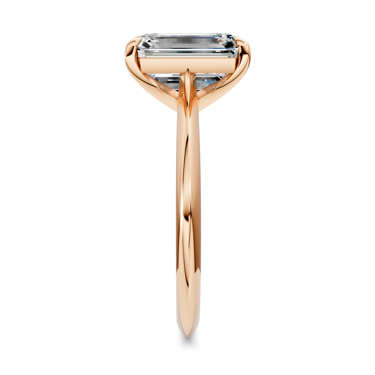 Rose gold solitaire ring with rectangular clear gemstone and slim tapered shank
