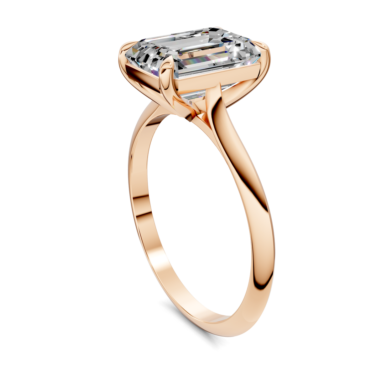 Rose gold solitaire ring with emerald-cut center stone in four corner prongs