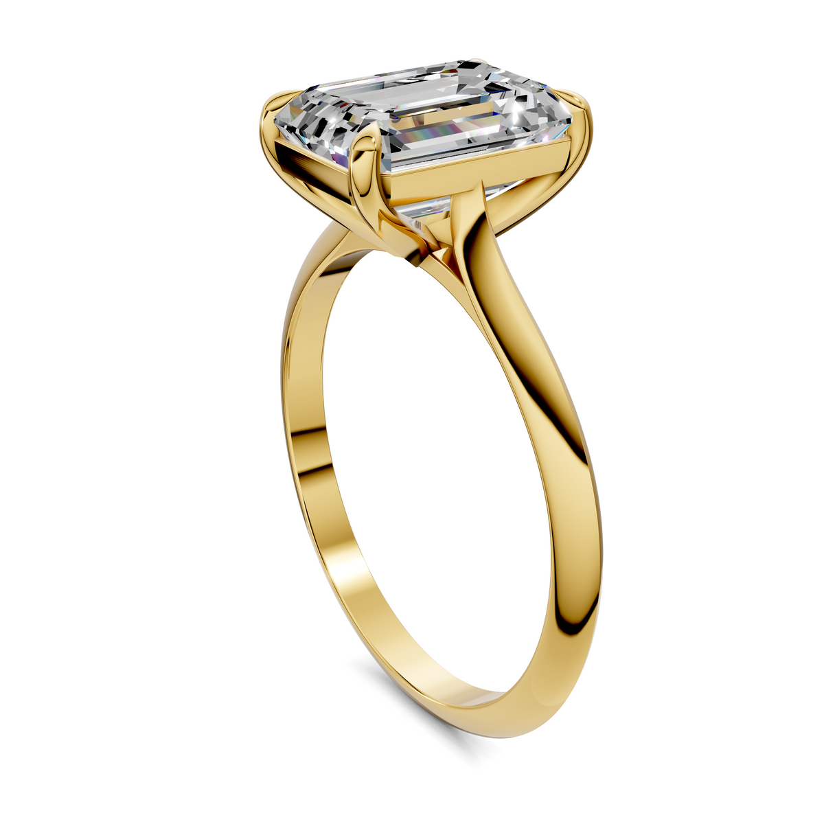 Yellow gold solitaire ring with emerald-cut stone in four corner prongs