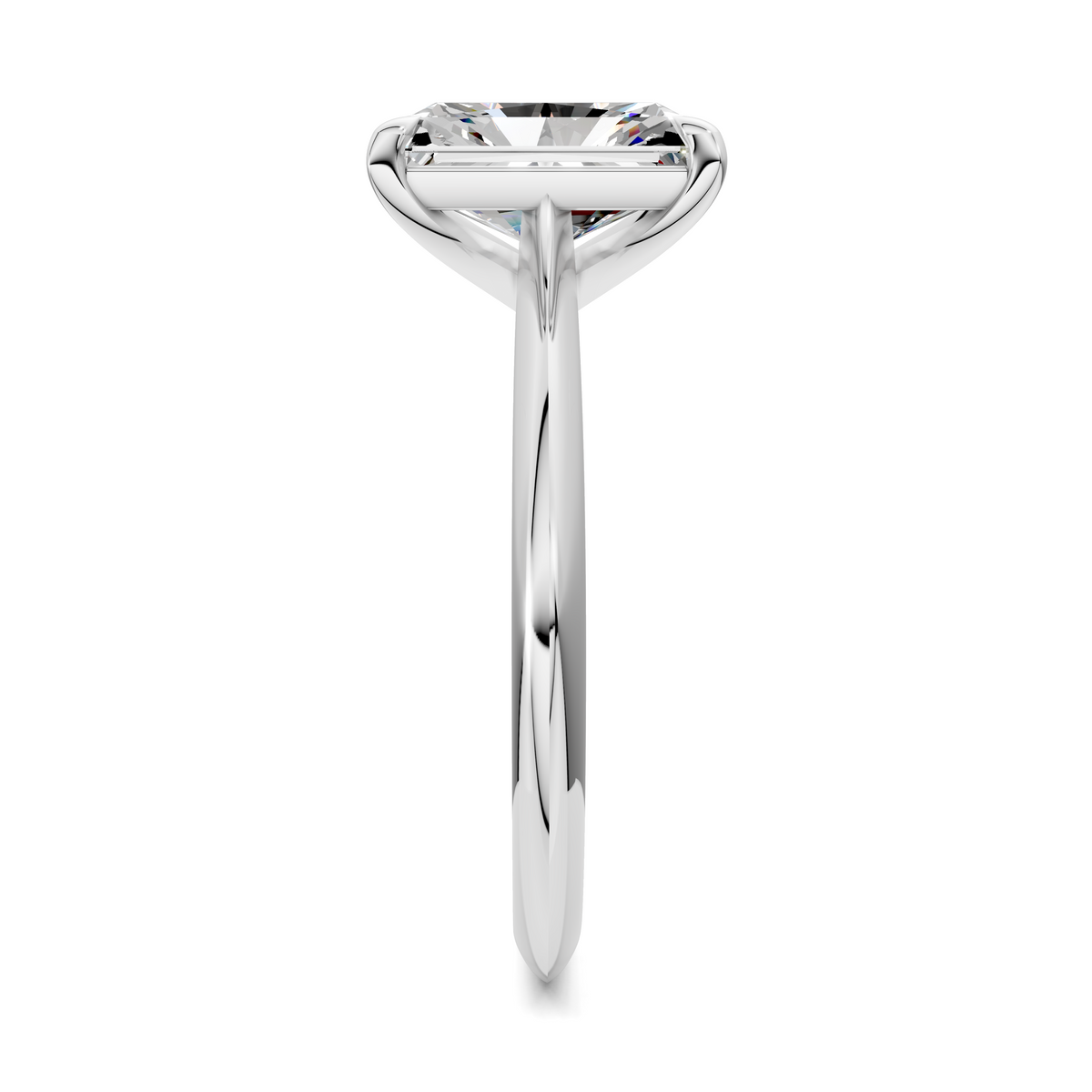 White gold solitaire ring with square-cut diamond and tapered shank, side