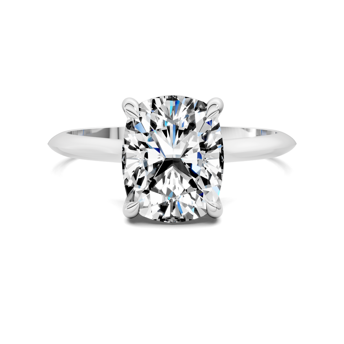 White gold solitaire ring with four-prong round diamond center stone