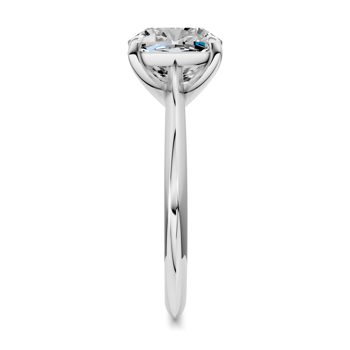 White gold solitaire ring top view, round diamond held by four prongs