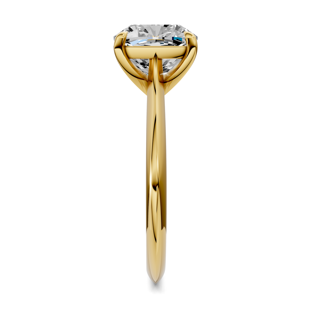 Yellow gold solitaire ring top view, round diamond held by four prongs