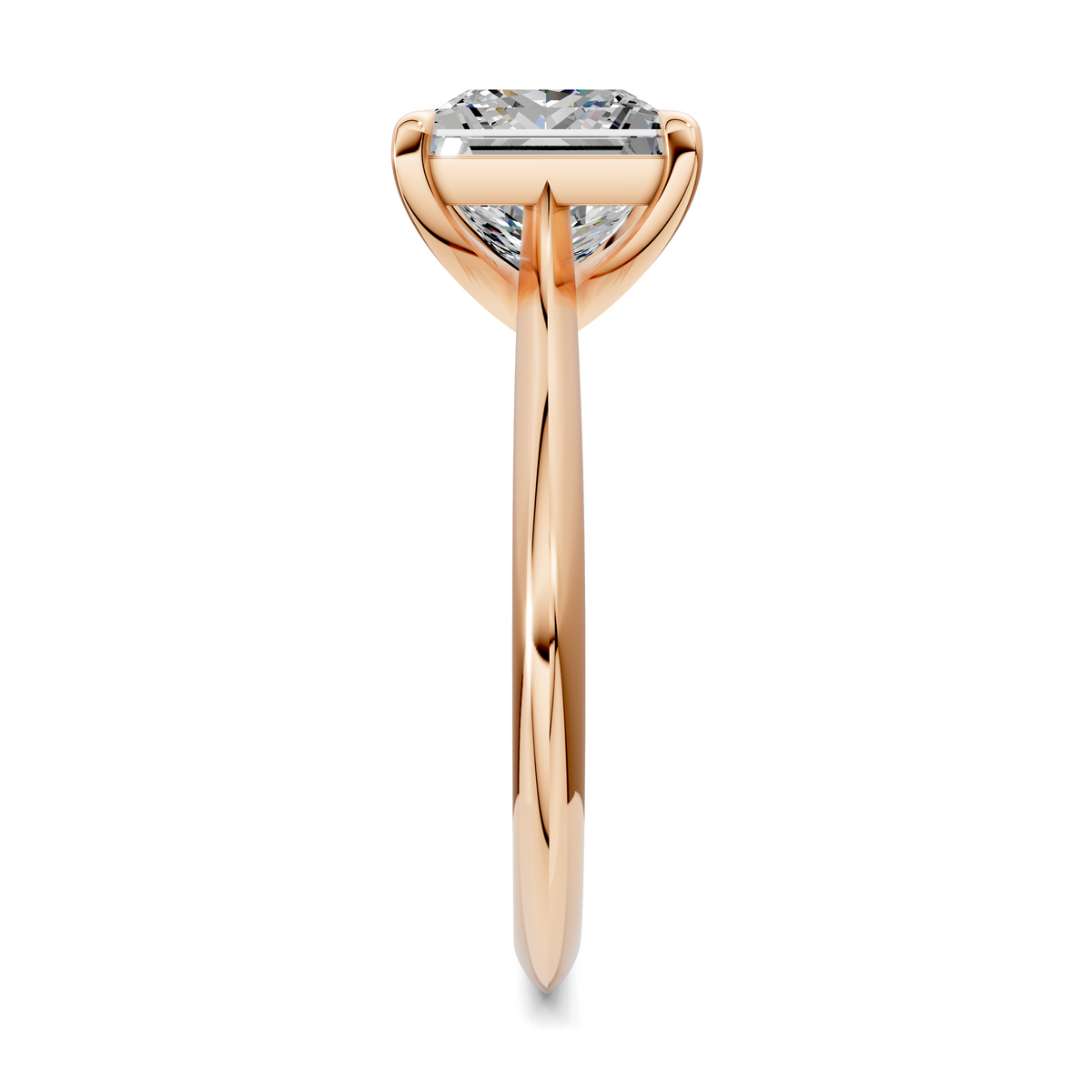 Rose gold solitaire ring side view with rectangular center stone in prongs