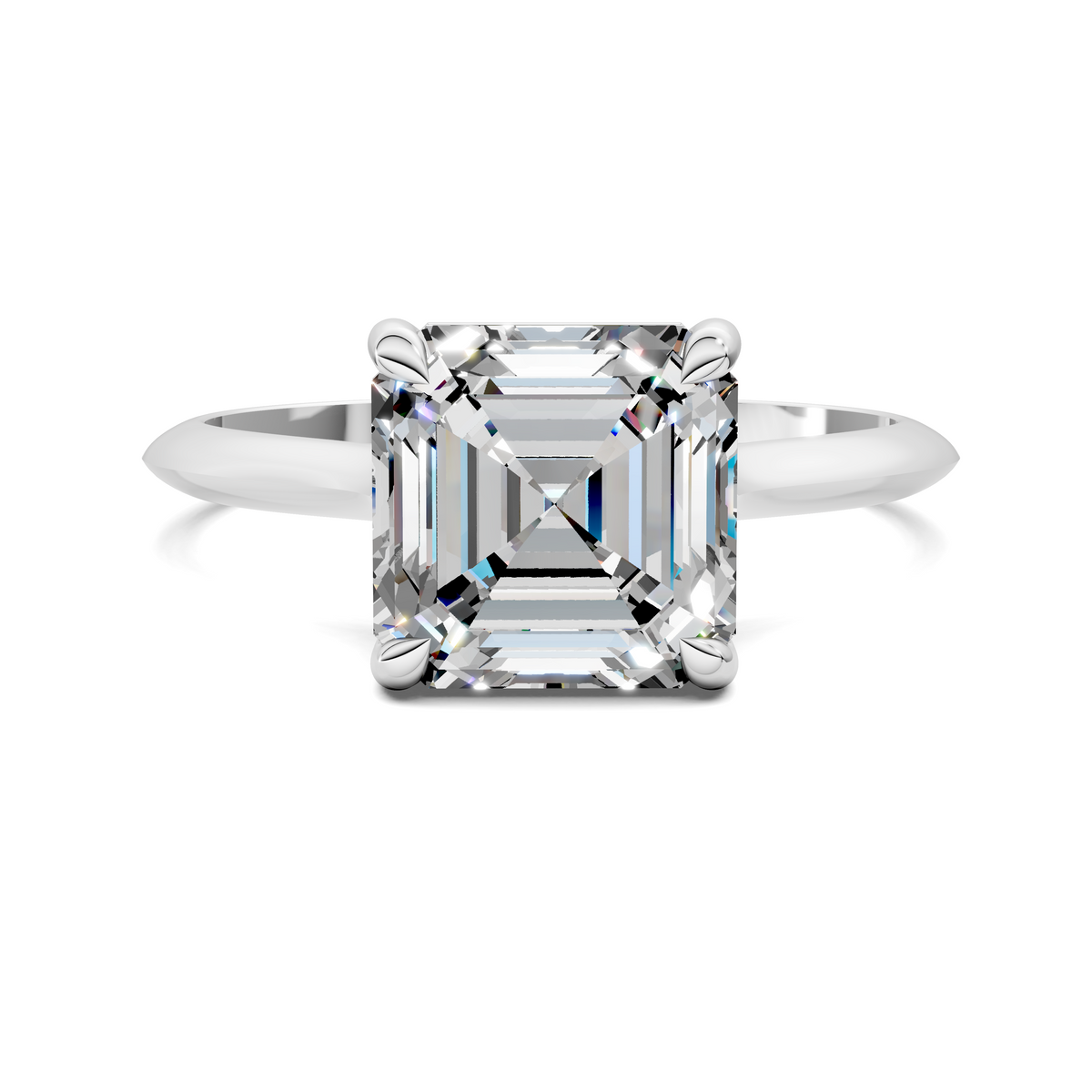 Solitaire ring with emerald-cut clear stone and four-prong setting on slim band