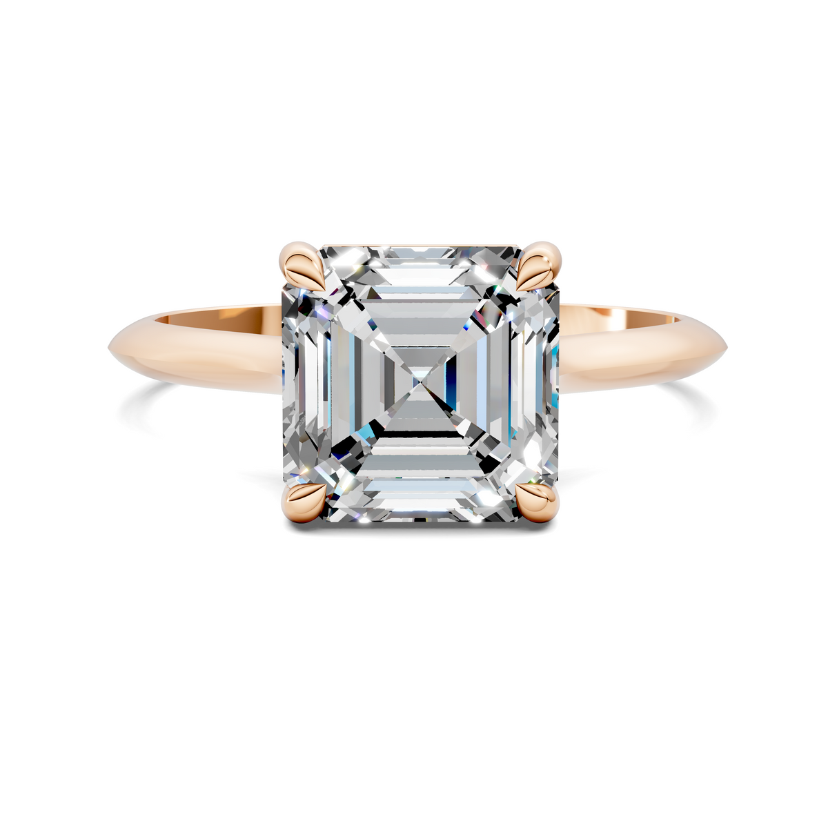 Rose gold solitaire ring with emerald-cut clear stone and four-prong setting