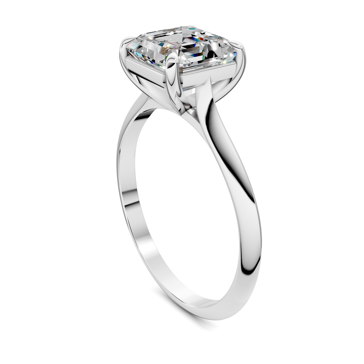 Solitaire diamond ring with emerald-cut stone in four-prong setting, curved shank