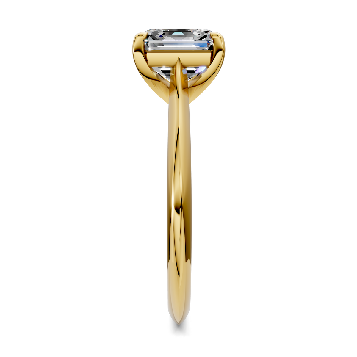 Yellow gold solitaire ring profile with emerald-cut stone and four-prong setting