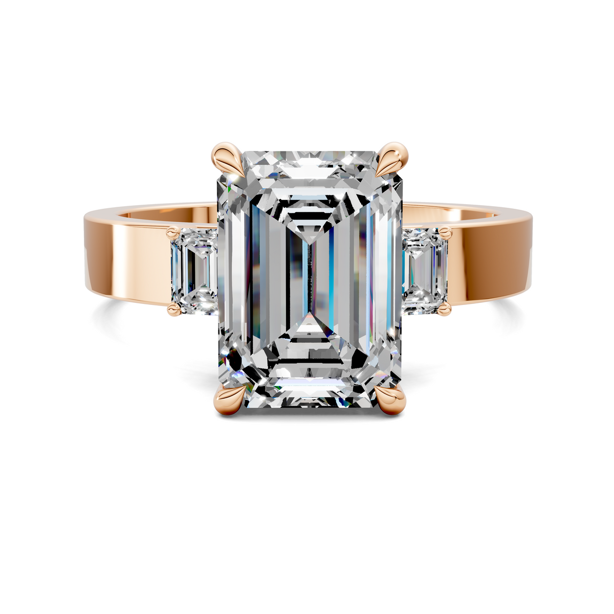 14K rose gold three-stone ring with emerald-cut center stone and side stones