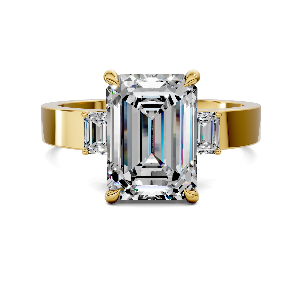 14K yellow gold three-stone ring with an emerald-cut center stone and side stones