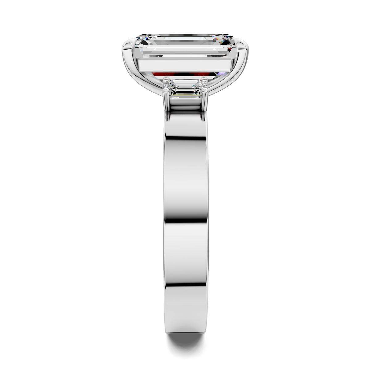 14K white gold three-stone ring side view, emerald-cut center stone with side stones