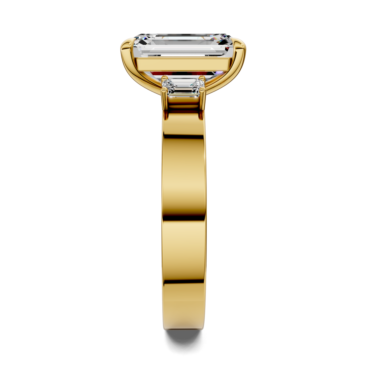 14K yellow gold three-stone ring side view, emerald-cut center stone with side stones