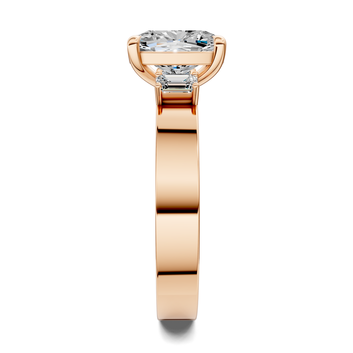 Three-stone diamond ring angled view with round center stone and baguette side stones, rose gold