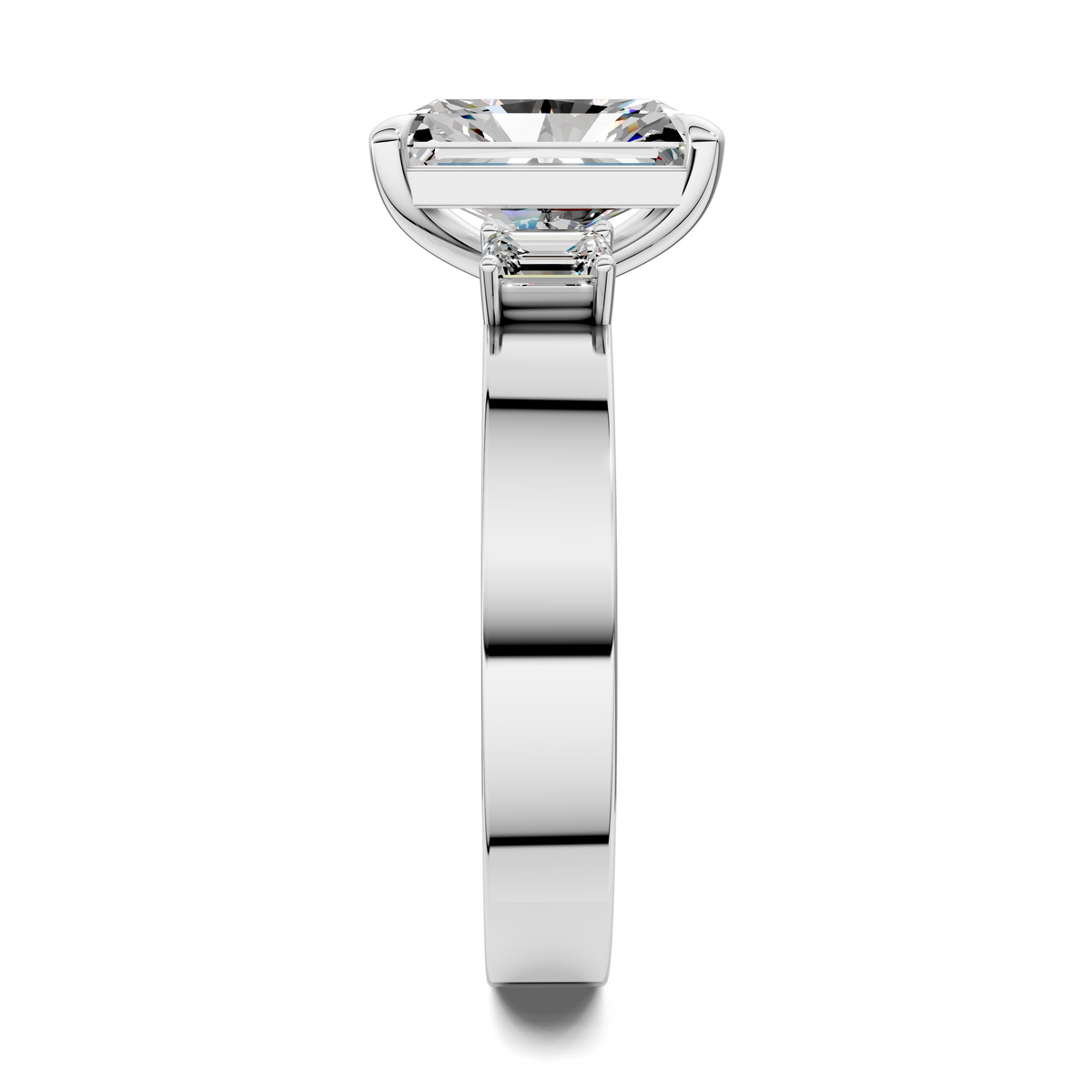 Three-stone ring side view with rectangular center stone in a prong-set bezel
