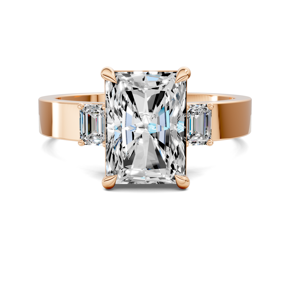 Three-stone ring in rose gold with prong-set cushion-cut center stone and two side stones