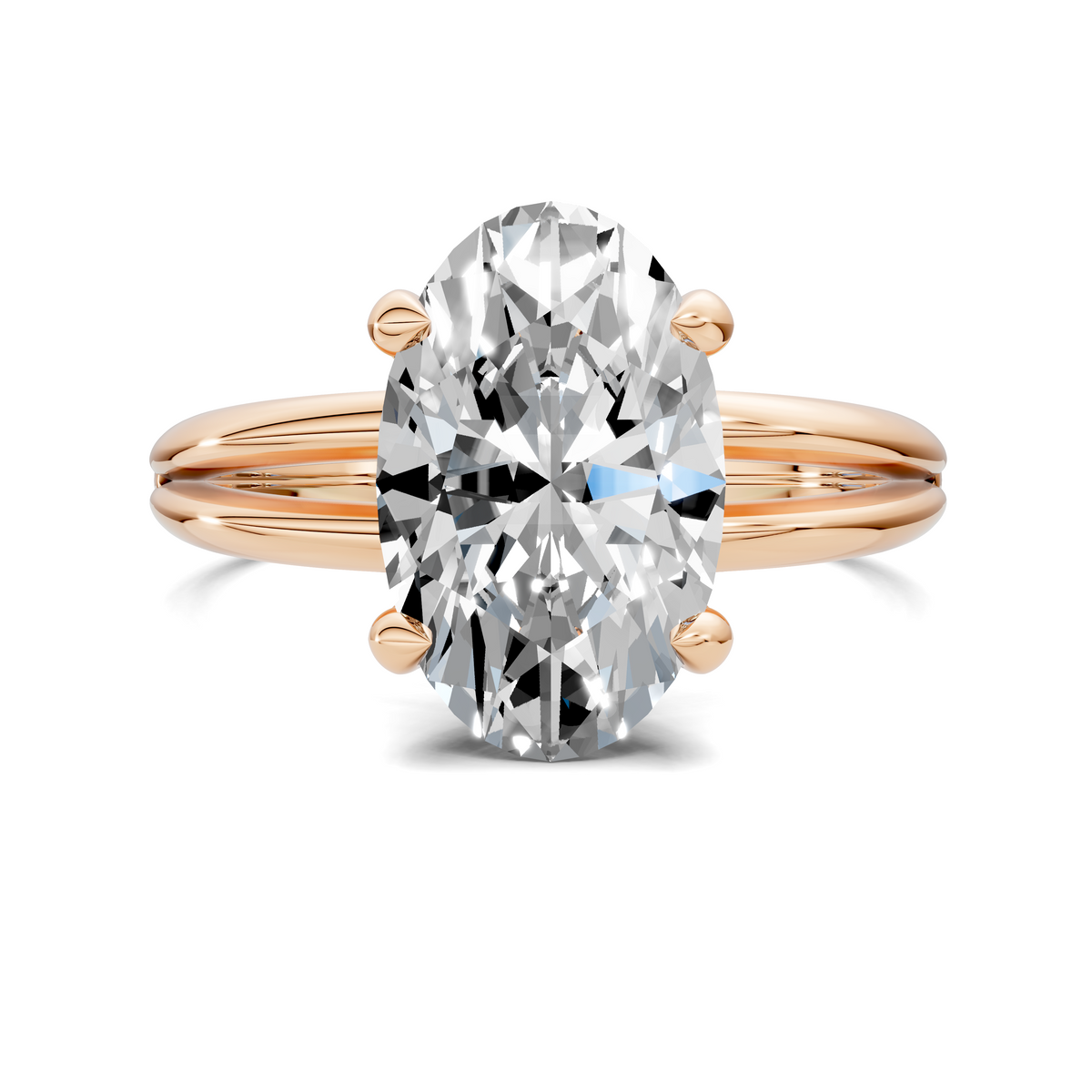 Gold ring with oval center diamond and four prongs, split band with small gold balls