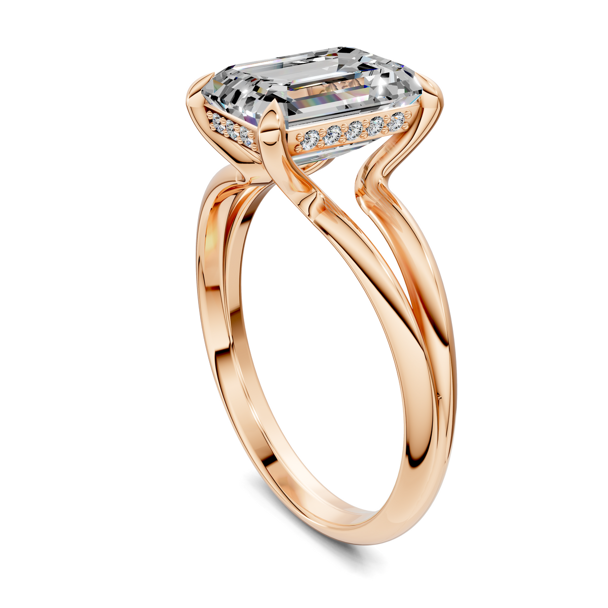 Split-band ring with an emerald-cut clear stone and pavé side accents in rose gold