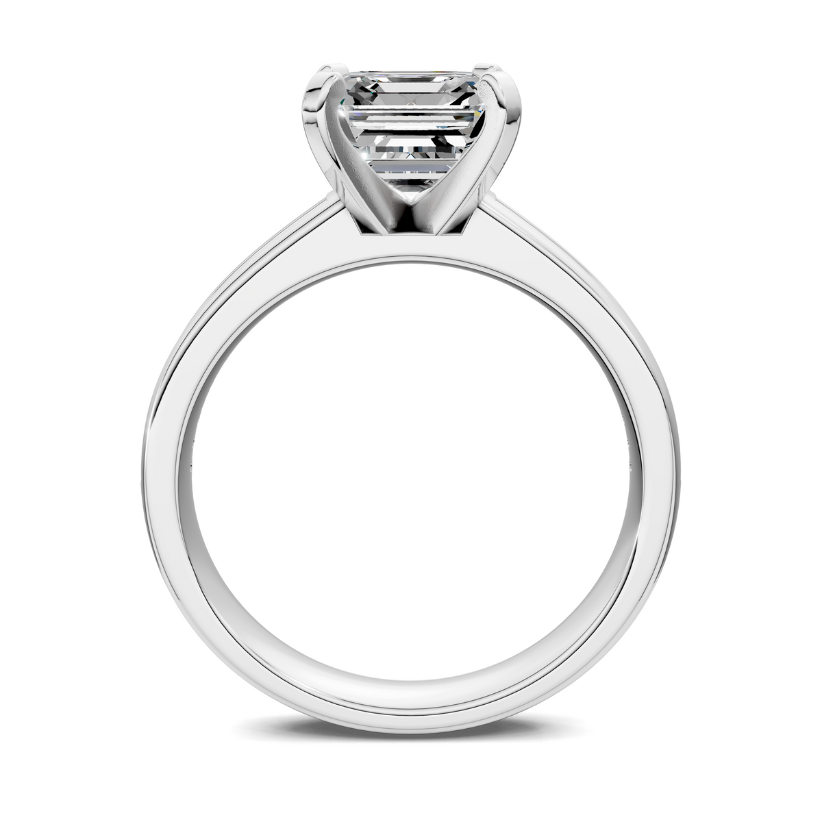 White gold ring with emerald-cut center stone and stepped prong setting