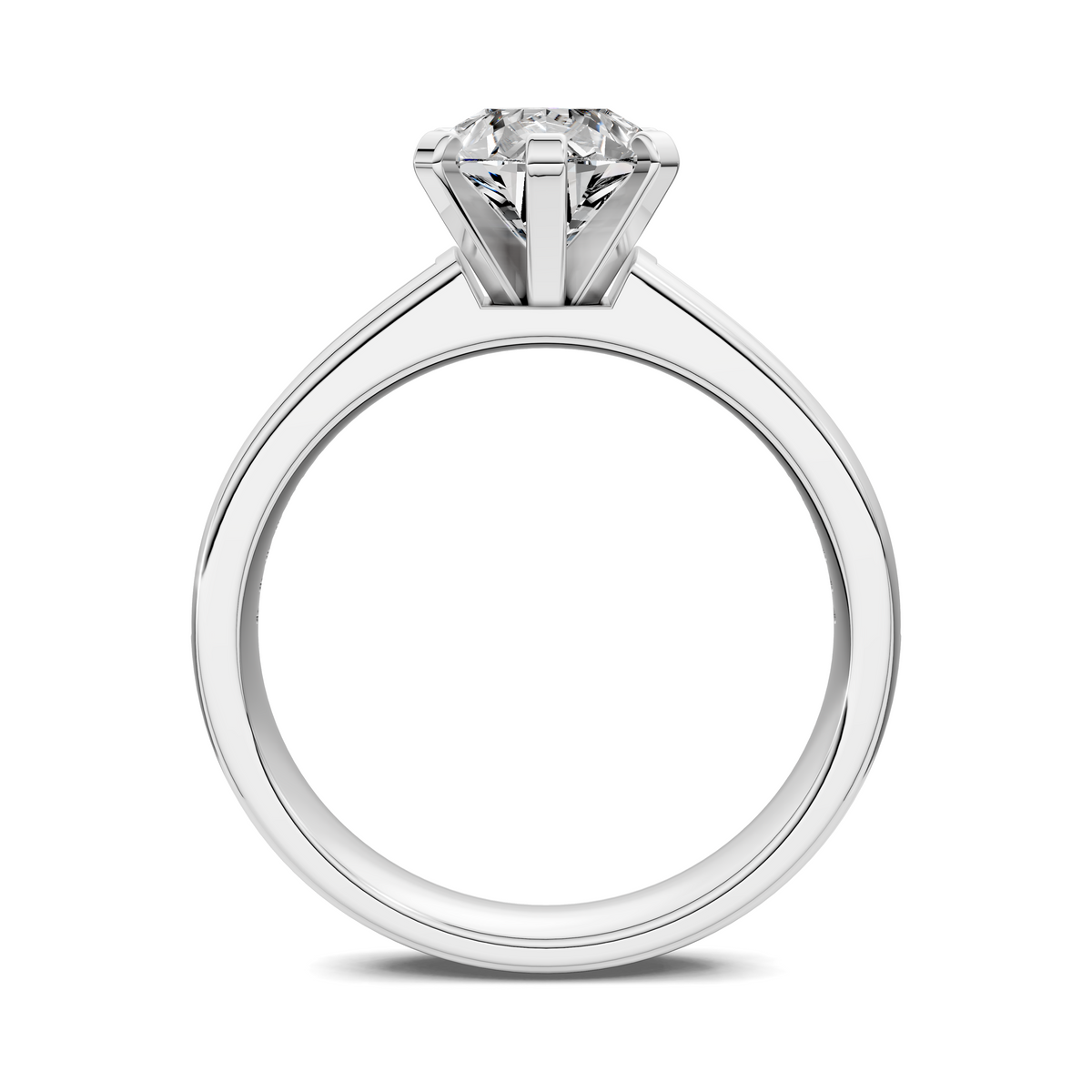 White gold ring with round center diamond and baguette channel band