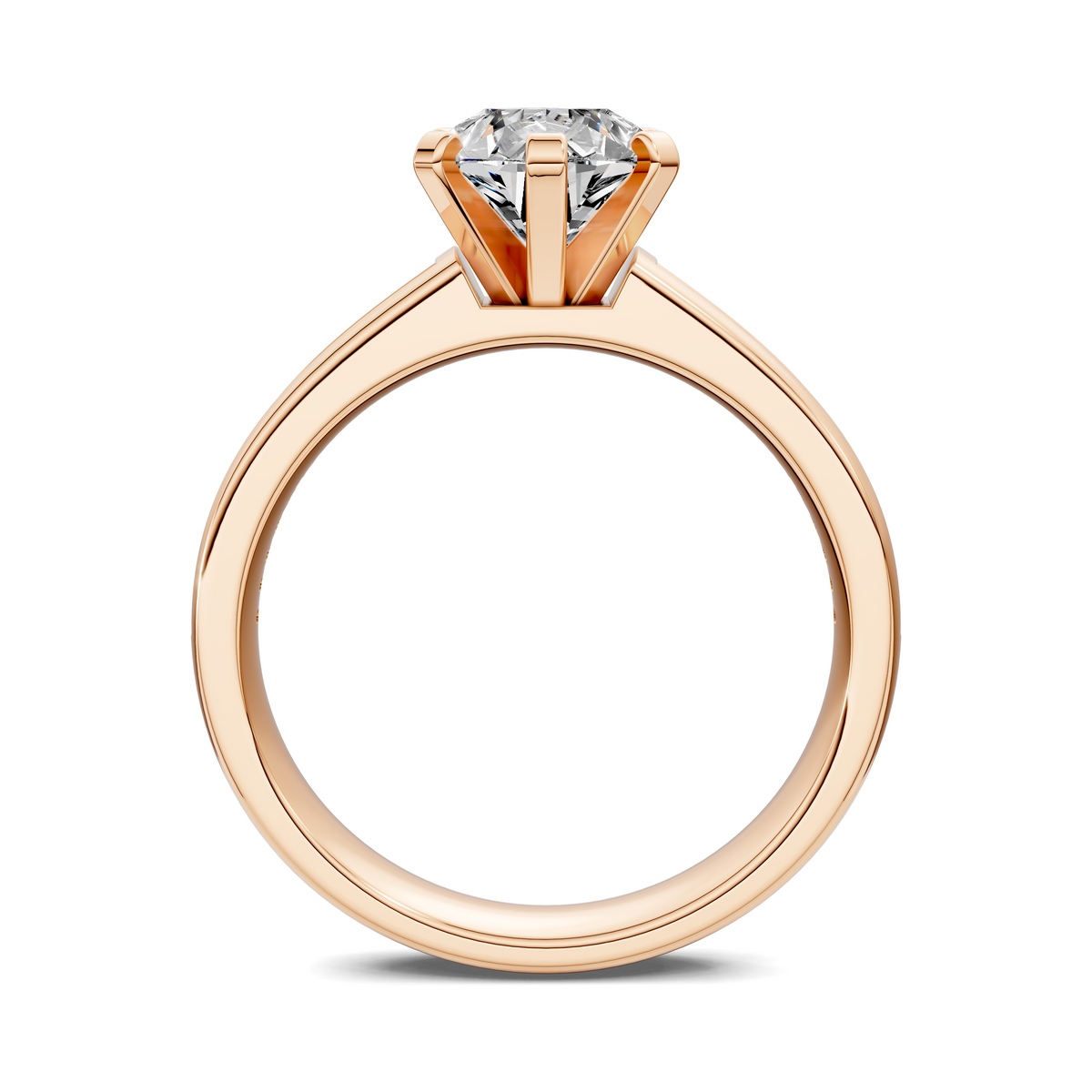 Rose gold ring with channel-set baguette stones and prong-set center stone