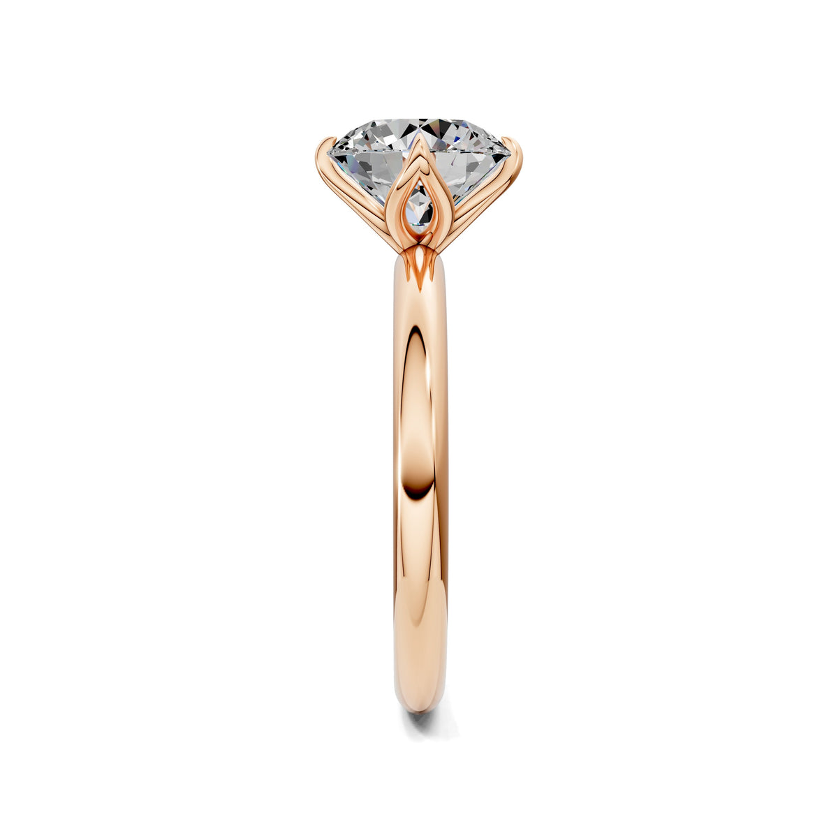 Rose gold solitaire engagement ring with round lab diamond top and tapered band
